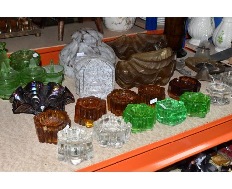 A QUANTITY OF VINTAGE COLOURED GLASS comprising thirteen glass piano rests to include four amber, three uranium green, and fi