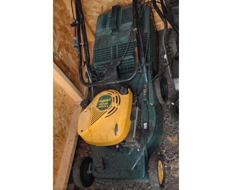 A MTD YARDMAN YM5518S PETROL LAWN MOWER with collection box (engine pulls freely but hasn't been started)