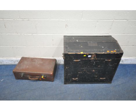 A BLACK PAINTED WOODEN DOMED TRUNK, with twin metal handles, width 75cm x depth 46cm x height 65cm, along with a leather suit