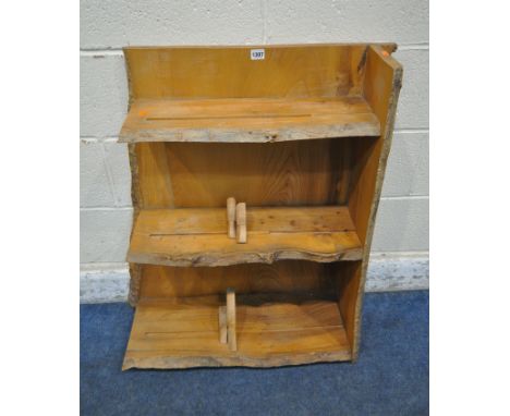 A BESPOKE LIVE EDGE STYLE BOOKCASE, with hedgehog book sliders, width 81cm x depth 30cm x height 86cm (condition report: top 