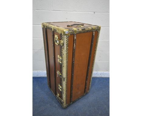 A LIGHT BROWN STEAMER TRUNK, with brass and wooden banding, length 111cm x 55cm x height 56cm (condition report: later added 