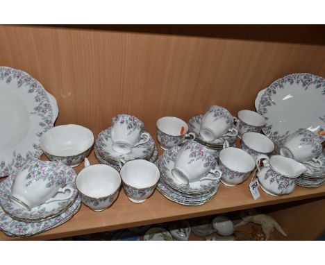 A QUANTITY OF ROYAL ALBERT 'ROSEDROP' PATTERN TEAWARE, comprising two tea plates, sugar bowl, milk jug, thirteen cups, fourte