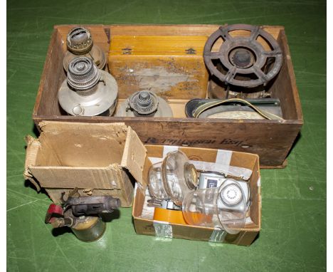 A vintage primus stove, blow lamp and oil lamp parts