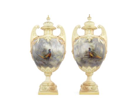 An impressive pair of Royal Worcester vases and covers by James Stinton, dated 1903Of ovoid shape, with twin high scrolled ha