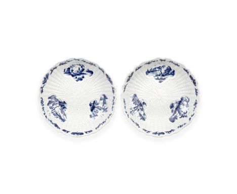 A rare pair of Worcester junket dishes, circa 1758Of lobed circular form, with crisply moulded basket-weave grounds reserving