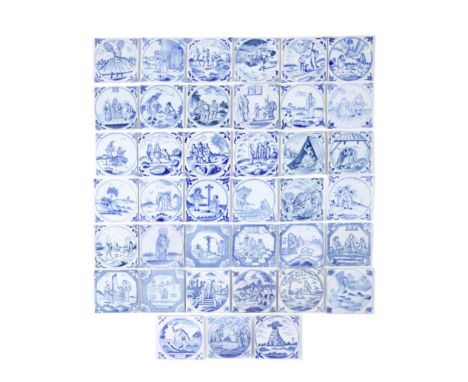 A collection of thirty-nine delftware tiles, mid-18th centuryPainted in blue with Biblical scenes, comprising twenty-six vari