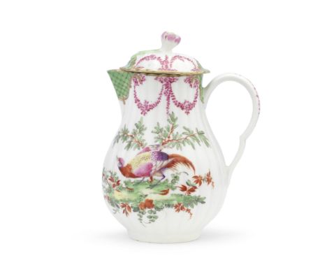 A Worcester milk jug and cover, circa 1775Of fluted baluster form with an ear-shaped handle, the cover with a flower finial, 