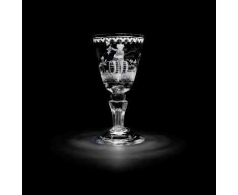 The Bacchus Goblet: an exceptional engraved ceremonial goblet, circa 1730-40The massive round funnel bowl with a teared base,