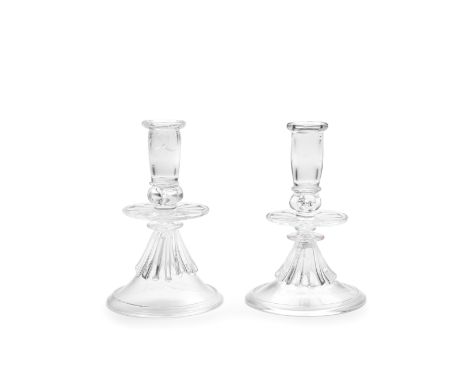 A rare pair of early glass candlesticks, probably French, late 17th centuryPerhaps Bernard Perrot, Orléans, with cylindrical 