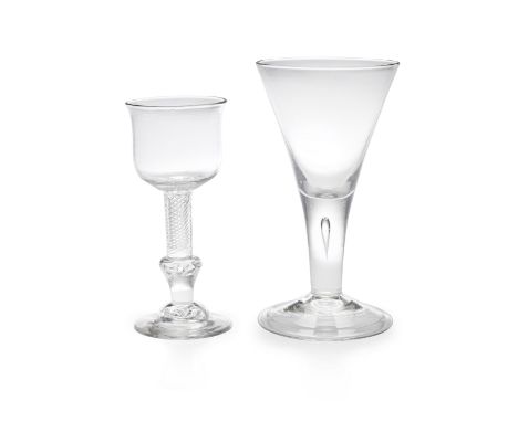 A large early goblet and an unusual composite-stem goblet, circa 1720-40The first with a generous drawn trumpet bowl on a tap