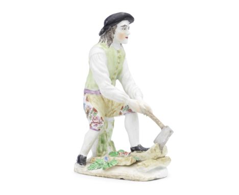 A rare Bow figure of a Woodcutter, circa 1760Modelled after a Meissen original by J J Kändler as a man splitting wood with an