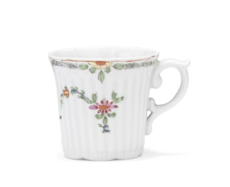 A Worcester coffee can, circa 1753-54Of small size with fine moulded fluting and a lobed rim and foot, the scrolled handle wi