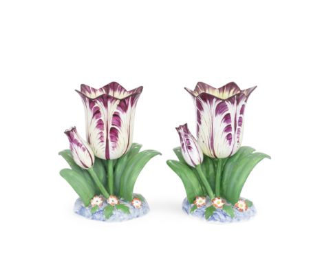 Two Staffordshire porcelain tulip vases, circa 1840Formed from a fully open bloom and a closed bud set among a fan of bright 