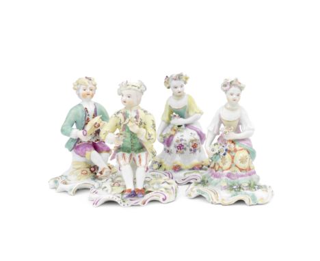 Two pairs of Derby figures emblematic of Spring and Summer, circa 1760-65Modelled as children seated on wide scrolled bases, 