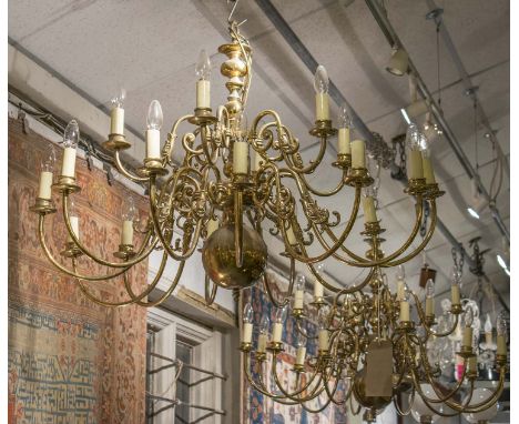 CHANDELIERS, a pair, Dutch style, brass, each with eighteen branches, approx. 99cm W x 69cm H excluding chain (with faults). 