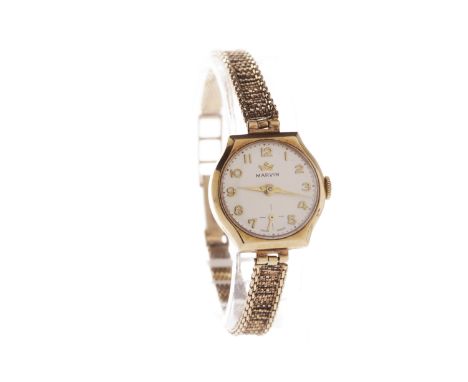 LADY'S MARVIN NINE CARAT GOLD MANUAL WIND WRIST WATCHsigned 17 jewel movement, 1960s, the round dial with applied gold colour