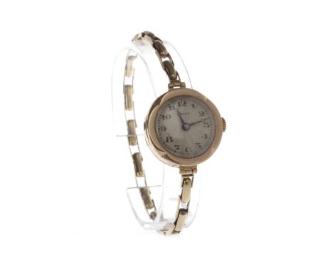 LADY'S MENEX EARLY TWENTIETH CENTURY NINE CARAT GOLD MANUAL WIND WRIST WATCHthe round dial with Arabic numerals in black, 24m
