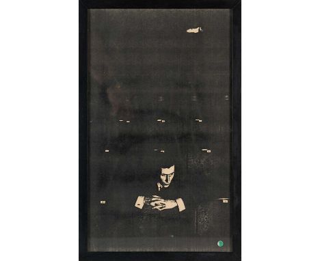 1957, black and white bromide print of John Osborne observing the stage from the stalls at the Royal Court Theatre; 34.5 x 20