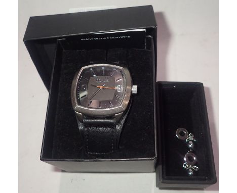 French Connection; gents wristwatch, boxed (requires battery), and a pair of boxed cufflinks. P&amp;P Group 1 (£14+VAT for th