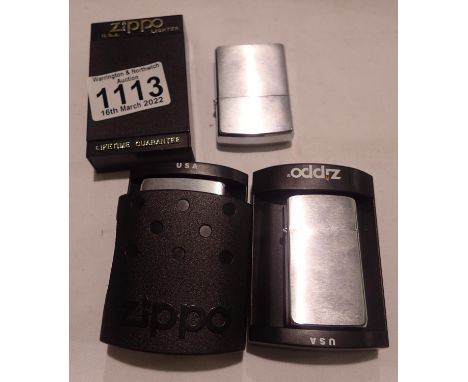 Three boxed Zippo lighters. P&amp;P Group 1 (£14+VAT for the first lot and £1+VAT for subsequent lots) 