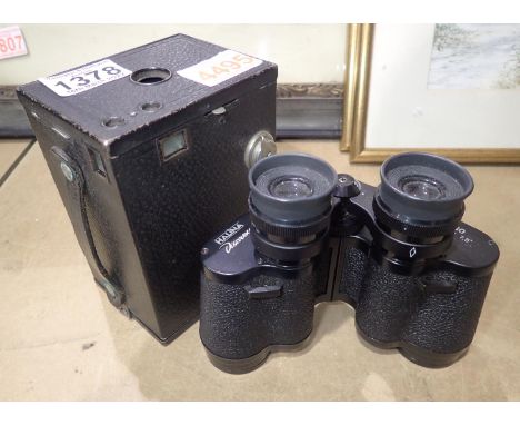 Kodak no 2 Brownie camera and a pair of binoculars. P&amp;P Group 3 (£25+VAT for the first lot and £5+VAT for subsequent lots