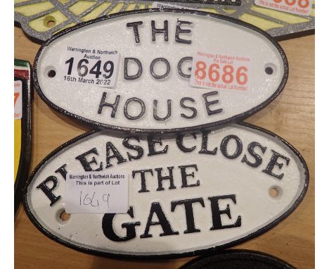 Cast iron Close The Gate sign in white, 18 x 9 cm and a cast iron The Dog House sign, 20 x 10 cm. P&amp;P Group 2 (£18+VAT fo