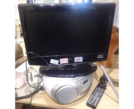 Small Alba TV with remote and a Philips CD player. Not available for in-house P&P, contact Paul O'Hea at Mailboxes on 01925 6