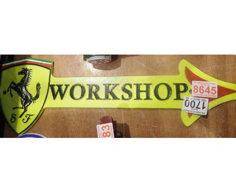 Cast iron Ferrari large yellow workshop arrow plaque, 40 x 12 cm. P&amp;P Group 2 (£18+VAT for the first lot and £3+VAT for s