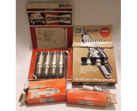 Box of champion and NGK spark plugs. P&amp;P Group 2 (£18+VAT for the first lot and £3+VAT for subsequent lots) 