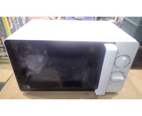 Morrisons branded 800w microwave, 45 x 33 x 25 cm. Not available for in-house P&P, contact Paul O'Hea at Mailboxes on 01925 6