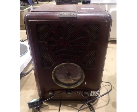 Bush Sunrise T702/A Art Deco wooden cased radio, 27 x 20 x 35 cm. Not available for in-house P&amp;P, contact Paul O'Hea at M