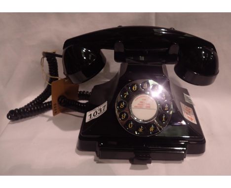 Black GPO Carrington, push button telephone in 1920s styling with pull-out pad tray; compatible with modern telephone banking