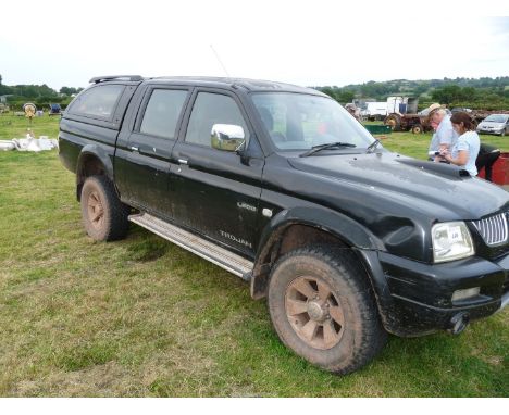 A Mitsubishi Trojan Pickup, L200, black Reg no.: YS56XJK, 1st reg'd 28/02/2007, 2477 cc diesel, M.O.T until 29.04.2025, owner