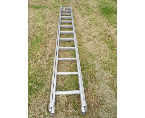 Aluminium extending ladder, two x 12 rungs.