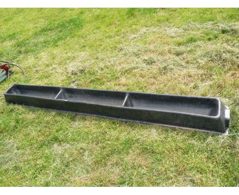 Plastic feed trough.