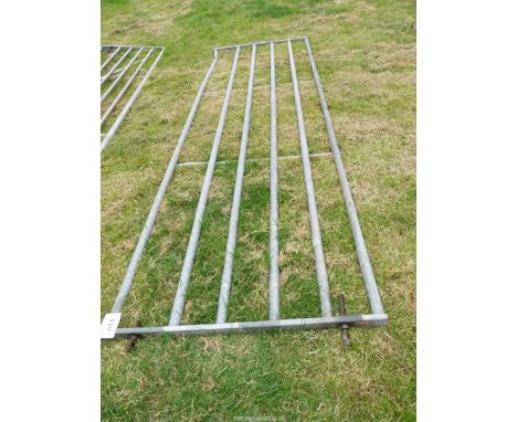 A heavy galvanised 12' approx. Steel Gate.
