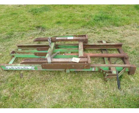 Rear mounting tractor fork-lift attachment.