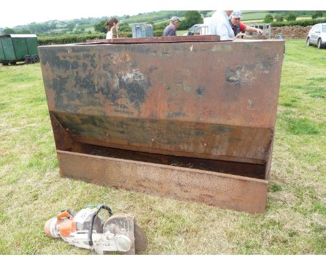Oil tank converted to hopper lamb feeder.