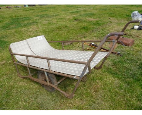 Trolley with aluminium tread plates and garden tractor draw bar.