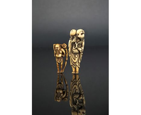 TWO JAPANESE IVORY NETSUKE 18TH AND 19TH CENTURIES The first depicting Tobosaku Sennin holding a peach branch, wearing long f