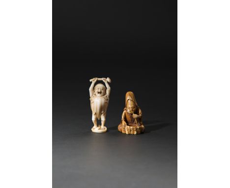 TWO JAPANESE IVORY NETSUKE MEIJI 1868-1912 The first carved as Fukurokuju sitting before a tree stump smoking his pipe, the b