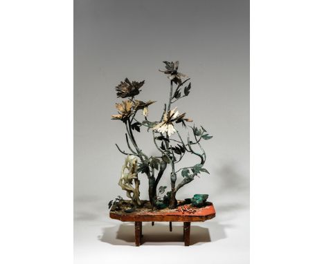 A CHINESE MODEL OF A GARDEN FROM A JARDINIERE QING DYNASTY Set with jade, coral, malachite and metal branches, 48cm.