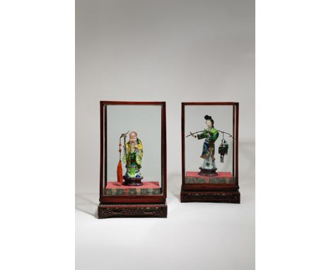 AN UNUSUAL PAIR OF CHINESE SILVER AND ENAMEL MODELS OF IMMORTALS LATE QING DYNASTY/REPUBLIC PERIOD One depicting Shoulao hold