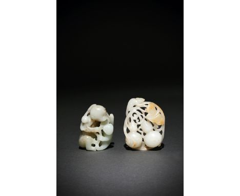 TWO CHINESE PALE CELADON JADE CARVINGS, 18TH/19TH CENTURY One depicting a monkey and her baby, holding a fruiting peach spray