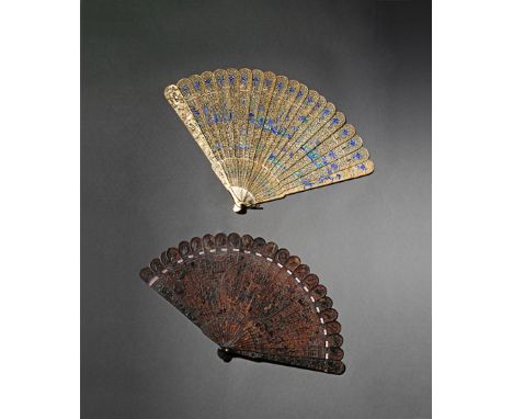 TWO CHINESE FANS QING DYNASTY AND LATER One in tortoiseshell, decorated with figures, pagodas and seashells, the other in gil