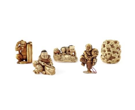 FIVE JAPANESE IVORY NETSUKE MEIJI 1868-1912 Variously carved as an oni beating a drum and another making a sword with an atte