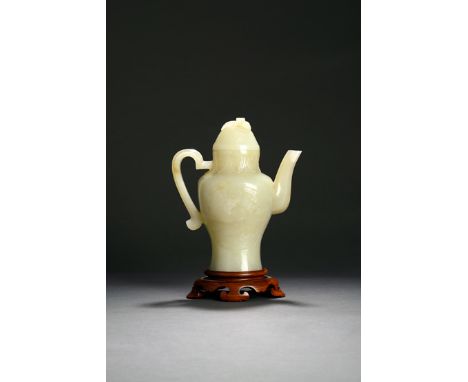 A CHINESE PALE CELADON JADE WINE EWER AND COVER, 18TH CENTURY The tapering body with a hexagonal spout and handle, carved in 