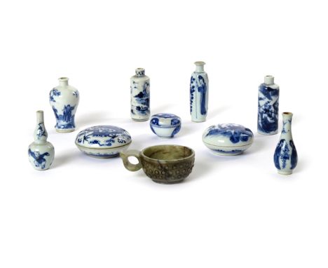 THREE CHINESE BLUE AND WHITE CIRCULAR BOXES AND COVERS QING DYNASTY Variously painted with figures, a dragon and geometric pa