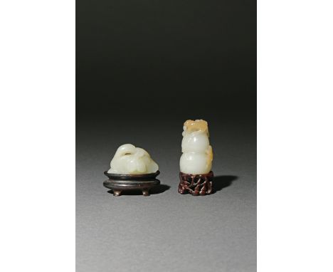 A CHINESE PALE CELADON JADE CARVING OF A GOURD, 18TH/19TH CENTURY Carved with a monkey and a bat clambering to the edge, and 