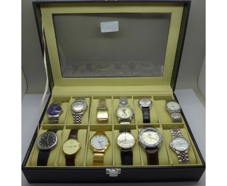 Twelve wristwatches in a display box, Sekonda, Rotary, Accurist, etc. 